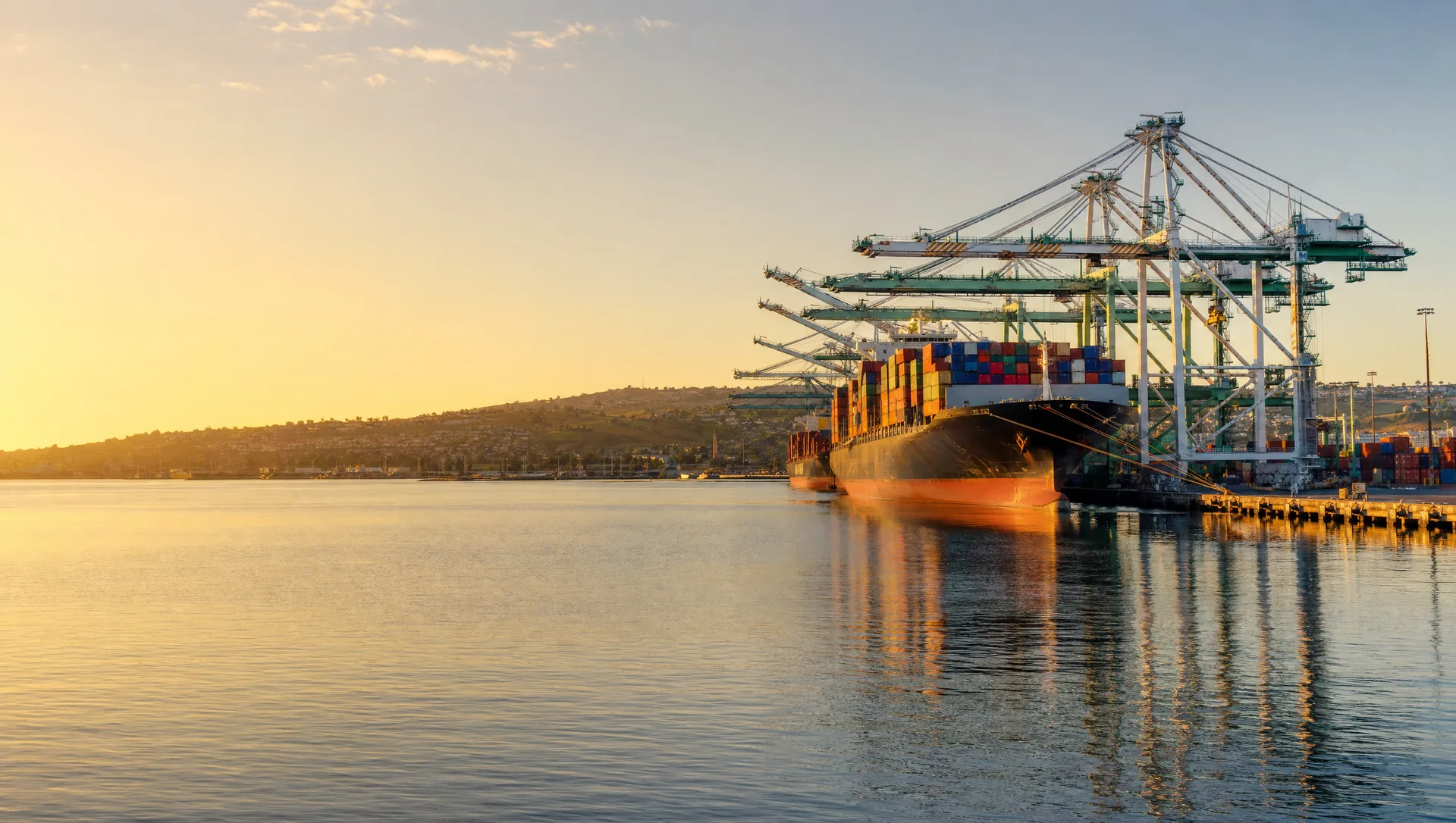 Aerial view of the Port of Los Angeles container terminal at golden hour — San Pedro, California
